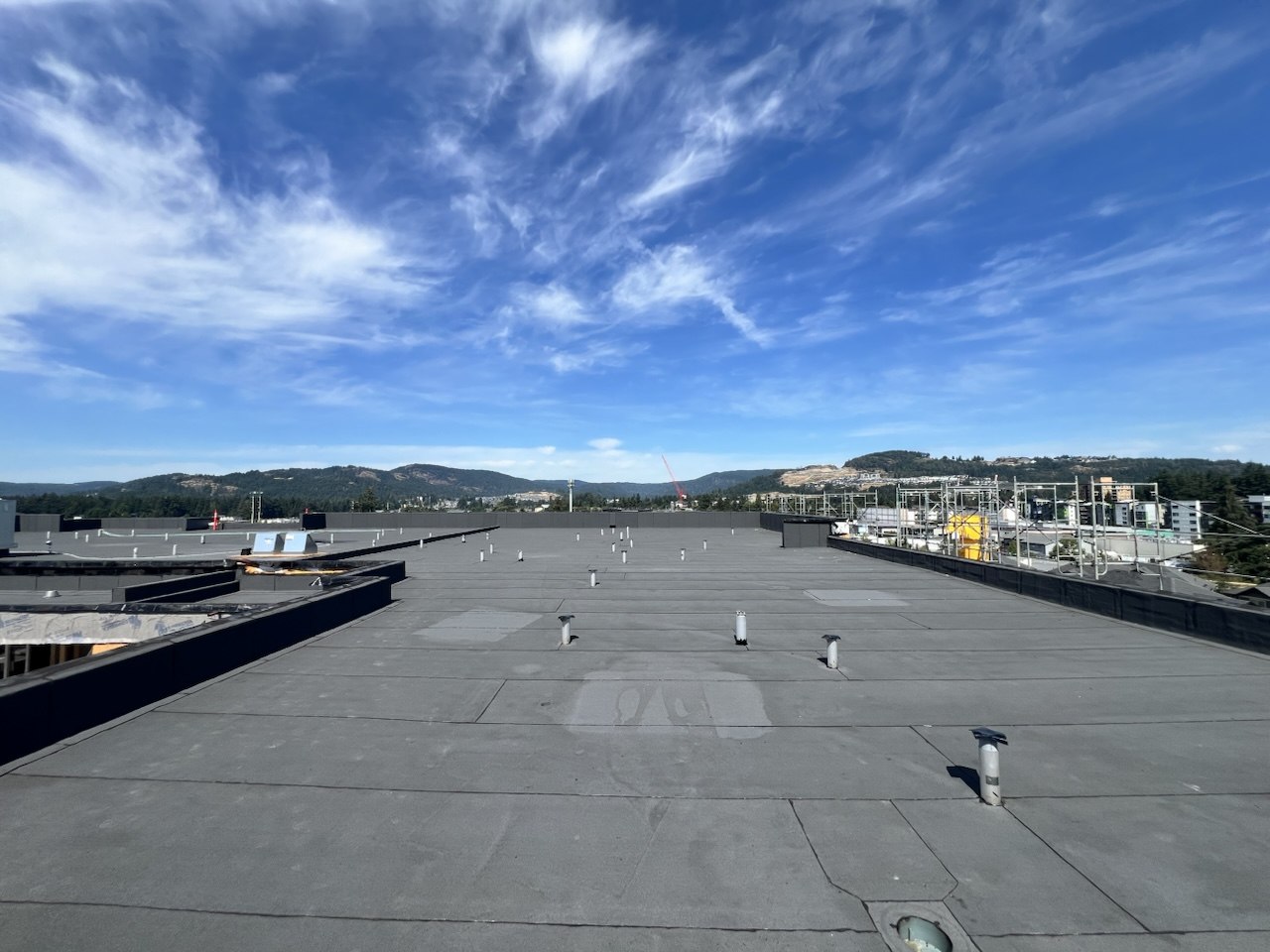 Wide commercial roof deck with new membrane